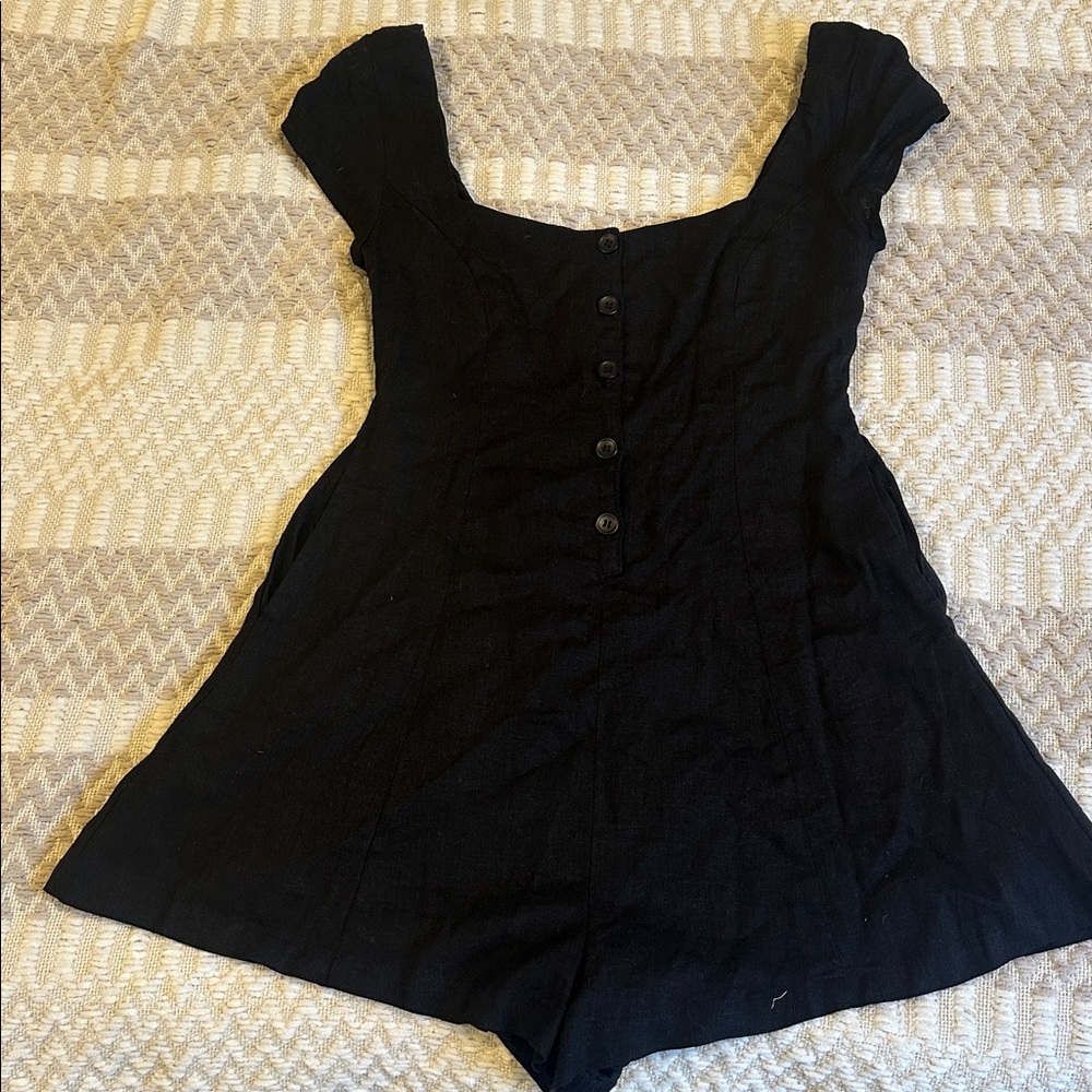 Princess Polly Black romper with button detail 
Size 4